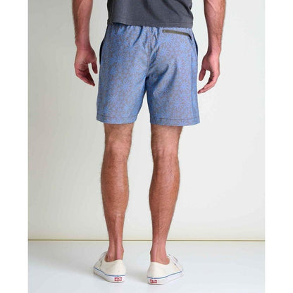 Back view of the Toad & Co Men's Boundless Pull-On Short in Raisin Tonal Print on a model wearing white sneakers against a plain background.
