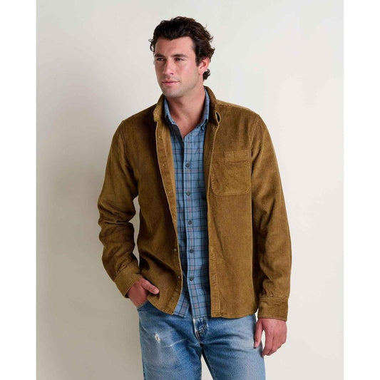 A model wearing the Toad & Co Men's Cassadia Long Sleeve Shirt in Honey Brown stands against a plain white background.