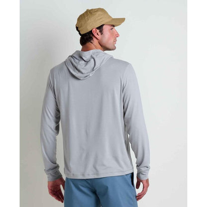 Back view of the Toad & Co Men's Swifty Long Hoodie in Light Ash on a model wearing blue shorts against a plain white background.