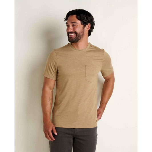 A man wears the Toad & Co Men's Tempo Short Sleeve Pocket Crew in Khaki against a plain white background.