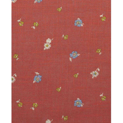 A close-up of the Toad & Co Women's Camp Cove Shirt in Crabapple showing small blue and white flowers on a red background.