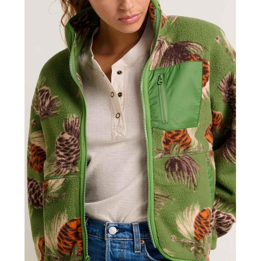 A model wears the Toad & Co Women's Campo Fleece Jacket in Artichoke Pinecone Print, showing the front zipper and chest pocket against a plain background.