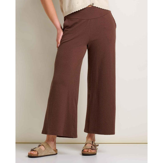 A front view of the Toad & Co Women's Chaka Wide Leg Pant in ChestnutTexture on a model wearing sandals against a plain background.