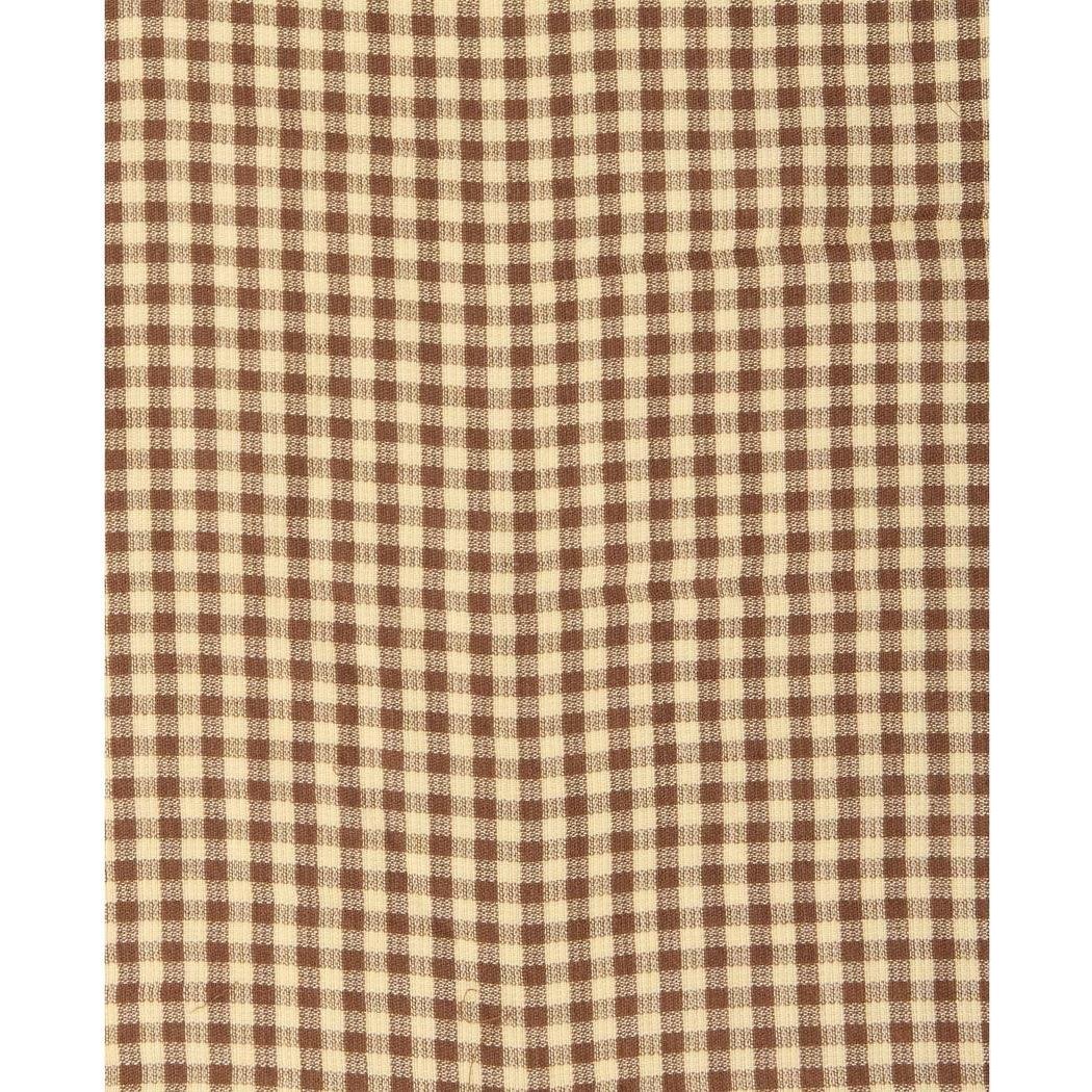 A close-up of the Toad & Co Women's Manzana Quilted Jacket in Partridge Gingham showing the gingham pattern.
