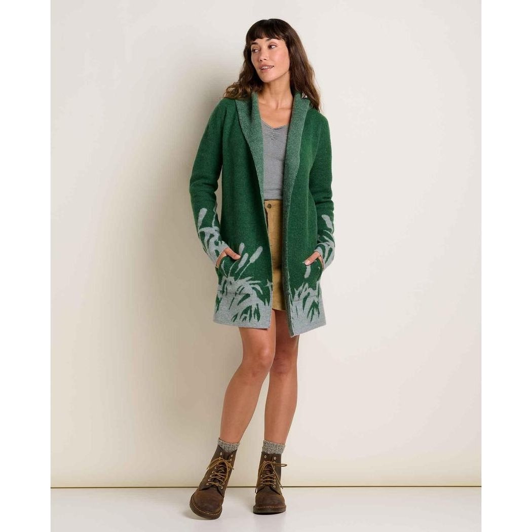 A model wearing the Toad & Co Women's Merino Heartfelt Hoodie in Coyote Ombre stands against a plain white background.