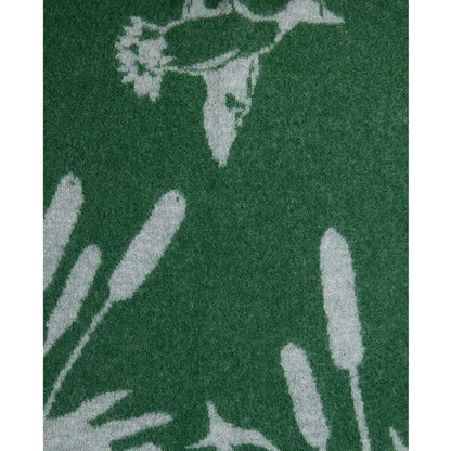 A close-up of the Toad & Co Women's Merino Heartfelt Hoodie in Coyote Ombre showing the hood and a nature-inspired print against a dark background.