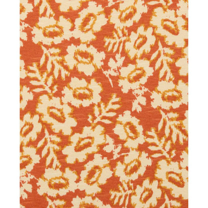 A close-up of the Toad & Co Women's Rosalinda Dress in Gourd Ikat Print showing the floral pattern and fabric texture.