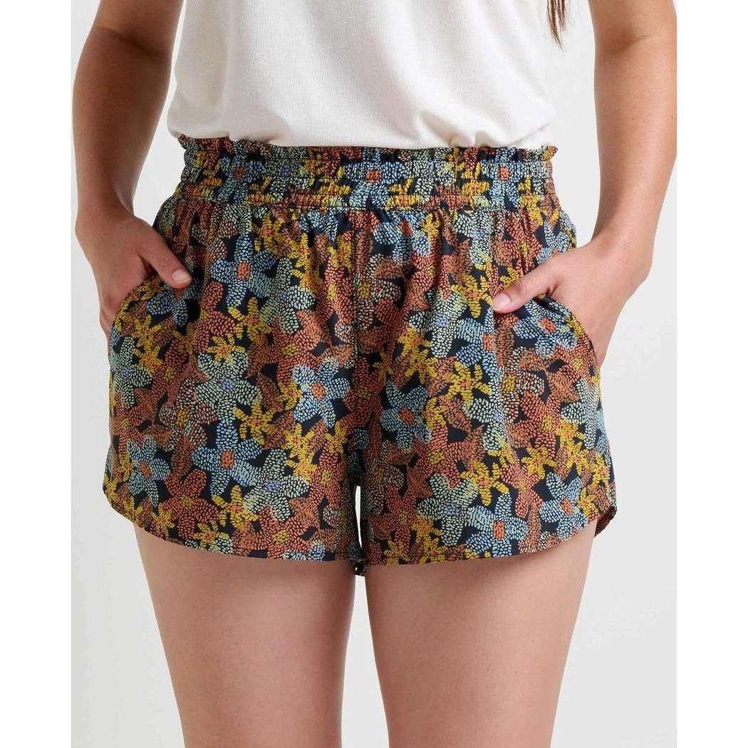 A front view of the Toad & Co Women's Sunkissed Pull-On Short in Almond Pattern Texture on a model with a white top.