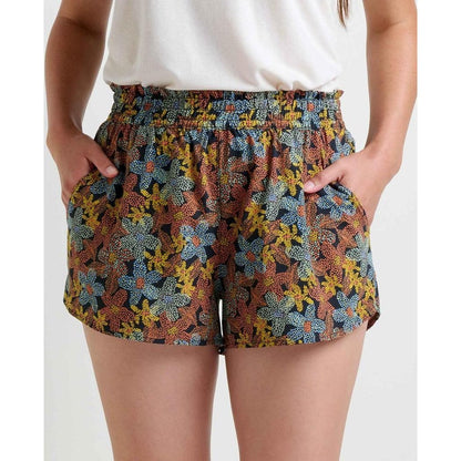 A front view of the Toad & Co Women's Sunkissed Pull-On Short in Almond Pattern Texture on a model with a white top.