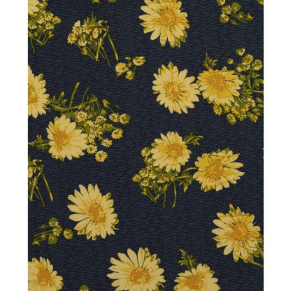 A Midnight Print fabric pattern with yellow daisies and small white flowers on a dark background for the Toad & Co Women's Sunkissed Weekend Skort.