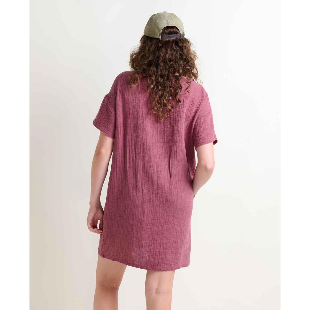 Back view of the Toad & Co Women's Tate Double Weave Short Sleeve Dress in Wild Ginger on a model wearing a cap against a plain white background.