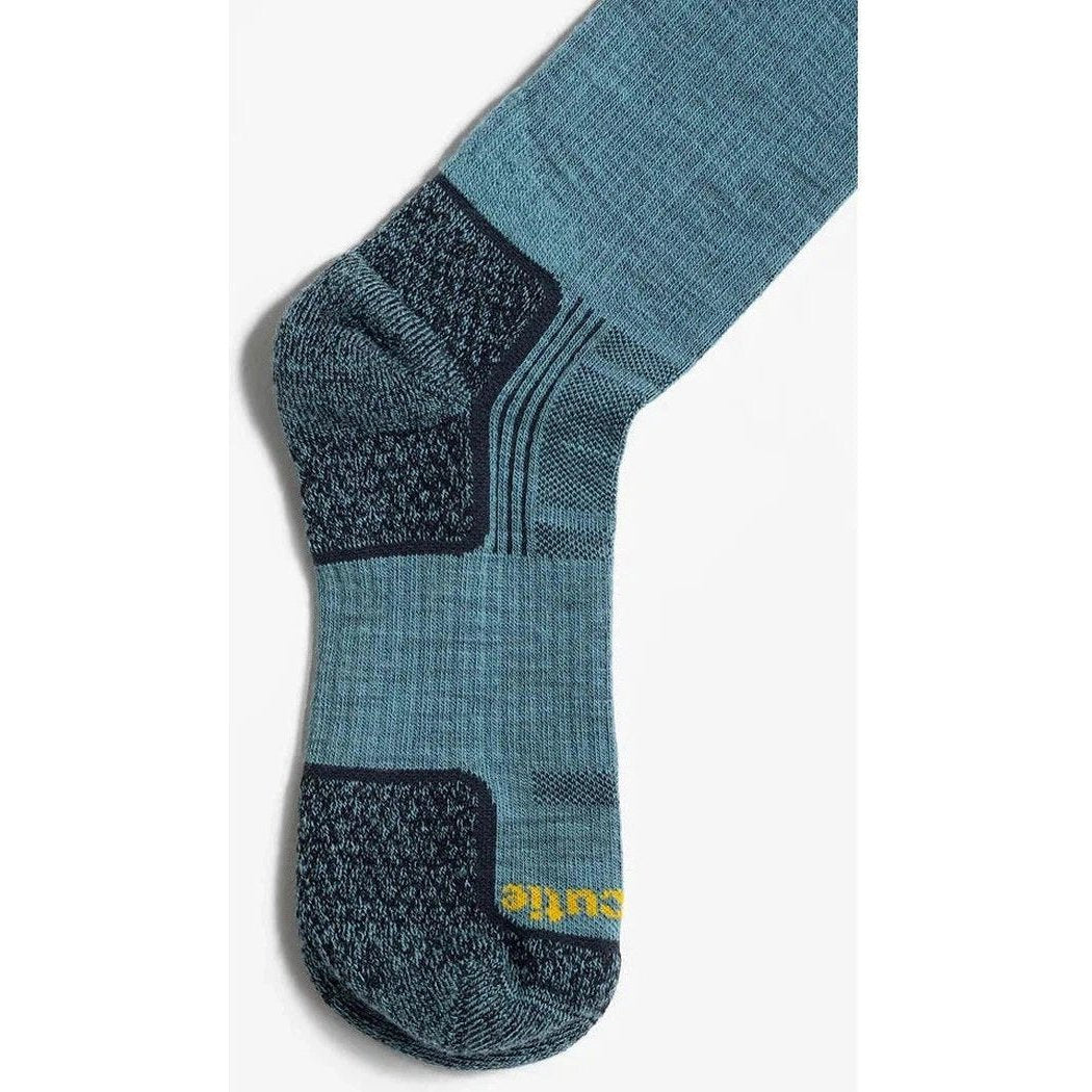 A close-up of the Tough Cuties Eve The Original Ladies Light Weight Hiker Crew sock in Blue Haze, showing the textured heel and toe areas against a plain white background.