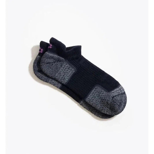 A pair of black Tough Cuties Eve The Original Ladies Light Weight Hiker No Show Tab socks with charcoal/gray heel and toe areas displayed on a white background.