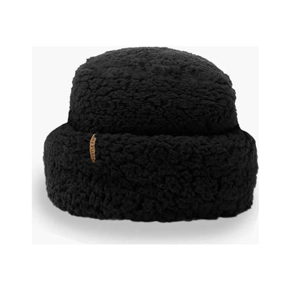 A front view of the Turtle Fur Comfort Lush Après Tort hat in Black with a small tag on the side against a white background.