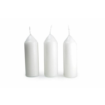 Three white UCO 9-Hour Candles - 3 Pack stand upright against a plain white background.