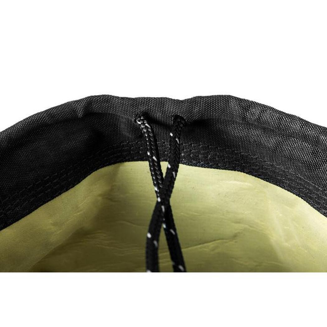 The close-up photo shows the drawstring closure of the black Ursack Allmitey Kodiak food storage bag against a white background.