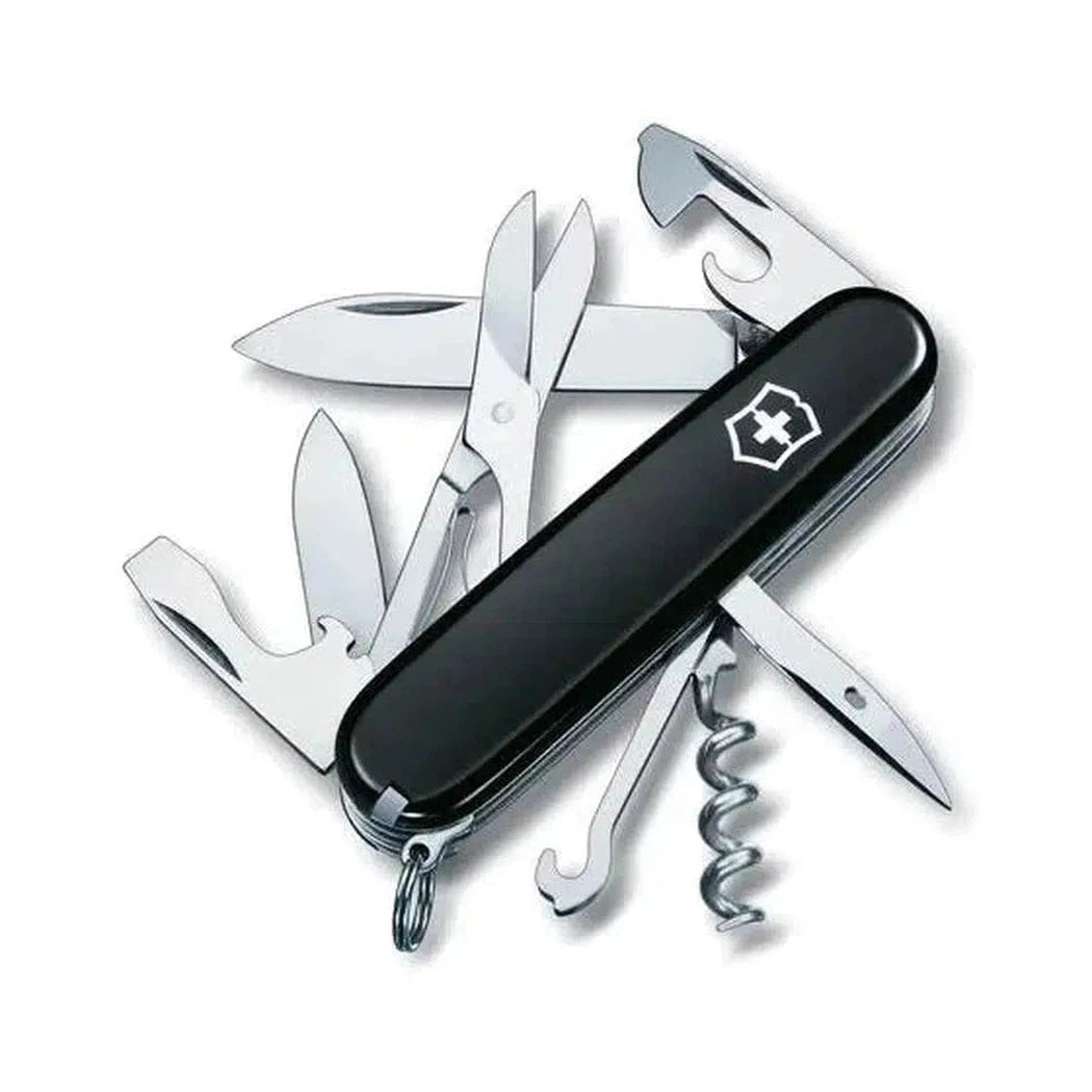 A black Victorinox Climber multi-tool with scissors, a corkscrew, and other tools visible, photographed against a white background.