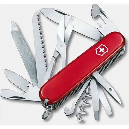 A red Victorinox Ranger multi-tool with various blades and tools extended, photographed from a top-down angle against a white background.