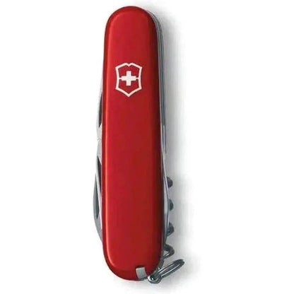 A red Victorinox Spartan pocket knife shown from the side with a white background.