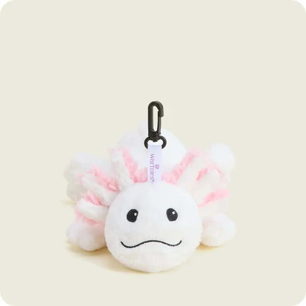 A white and pink Warmies Axolotl Bag Charm with a black carabiner hangs against a light background.