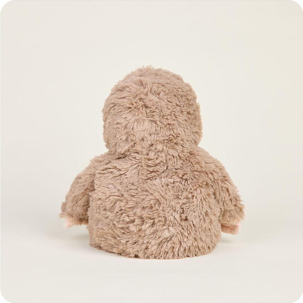 Back view of the Warmies BigFoot plush toy with a plain white background.