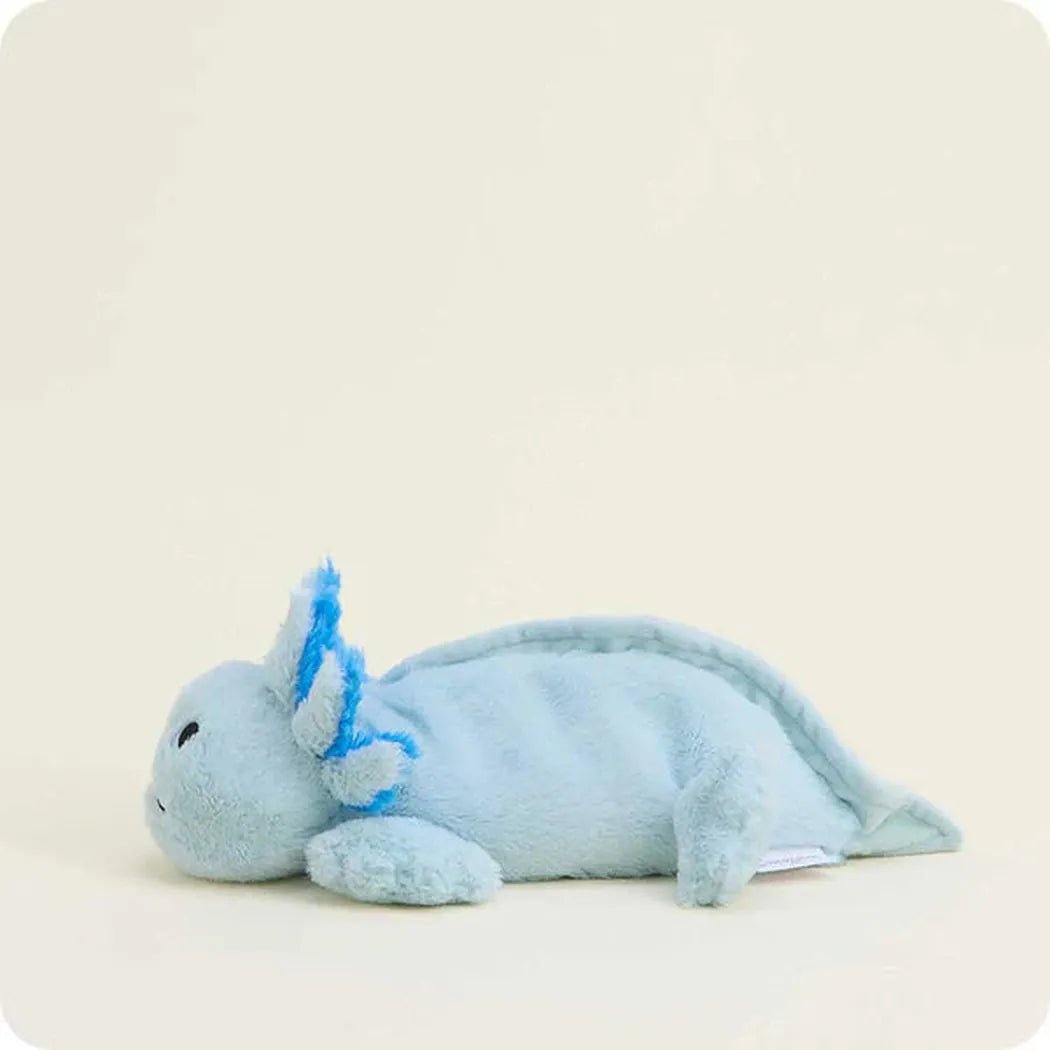 A side view of the Warmies Blue Axolotl Junior plush toy lying down against a light background.