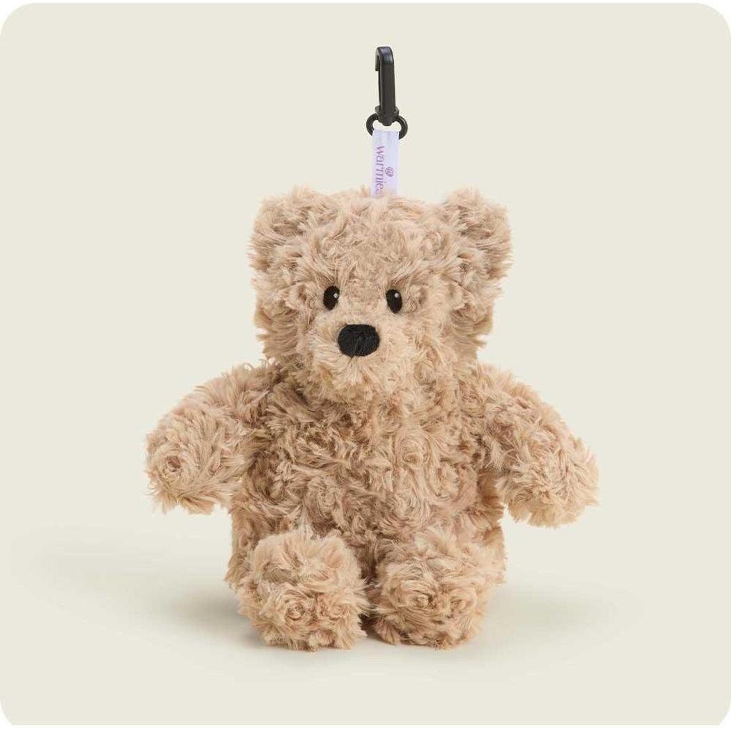 A close-up of the Warmies Brown Curly Bear Bag Charm hanging from a black carabiner against a plain white background.