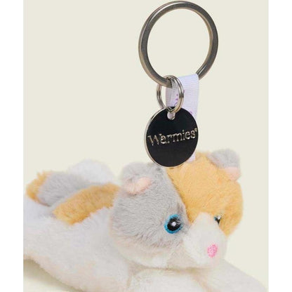 A close-up of the Warmies Calico Cat Keyring with a black tag and a white background.