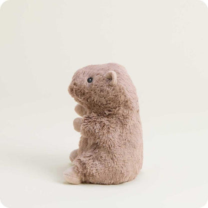 A side view of the Warmies Capybara Junior plush toy against a plain white background.