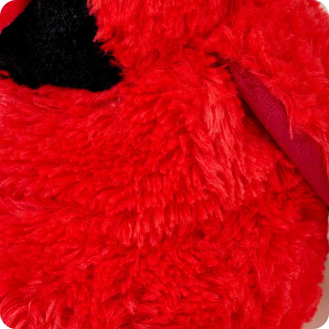 A close-up of the Warmies Cardinal showing its bright red fur and black beak detail.
