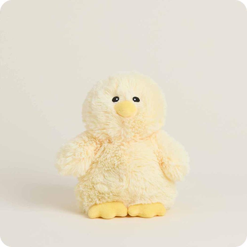 A front view of the Warmies Chick Warmies Junior stuffed animal with a soft, fuzzy texture and yellow feet against a plain white background.