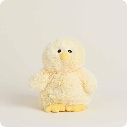 A front view of the Warmies Chick Warmies Junior stuffed animal with a soft, fuzzy texture and yellow feet against a plain white background.