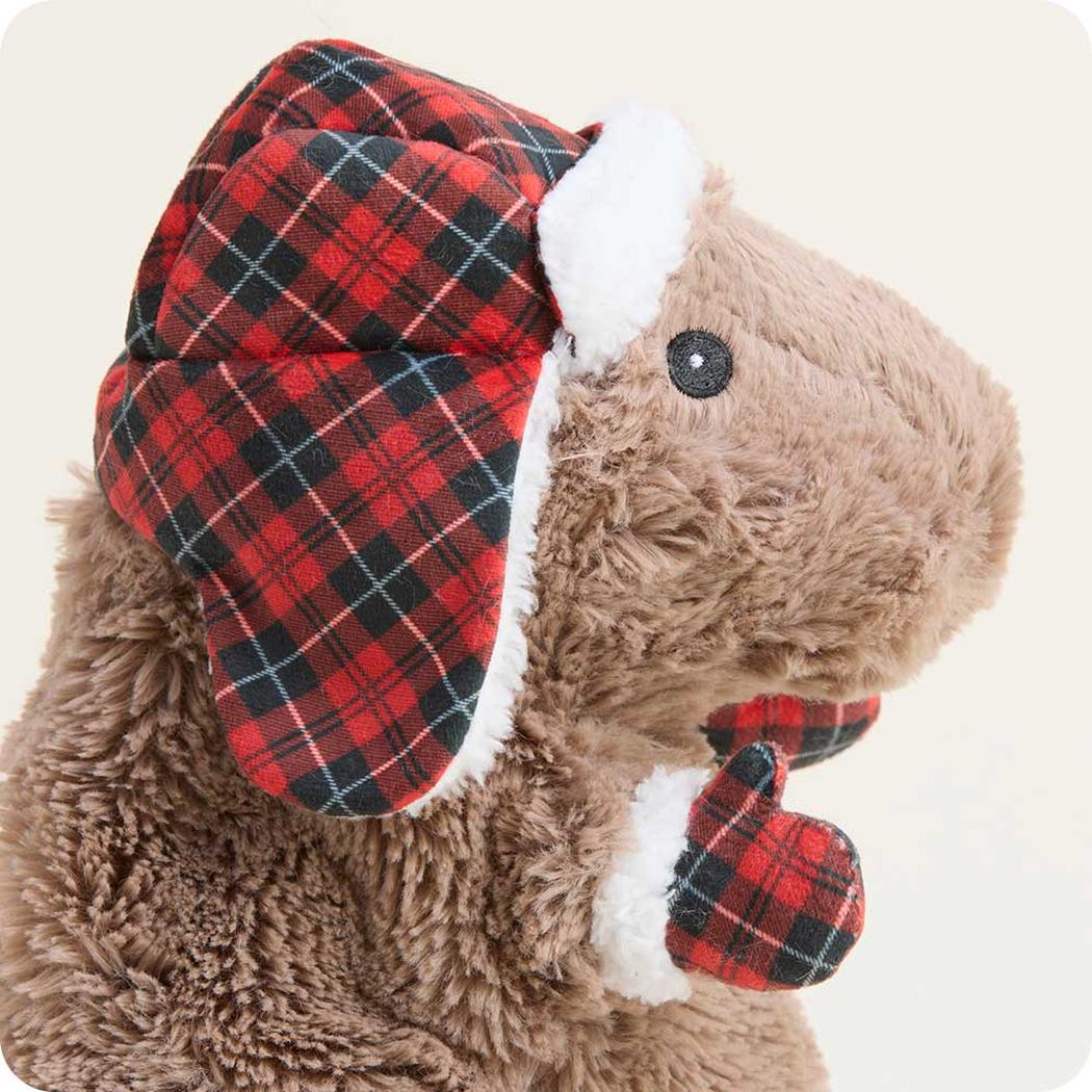 A side view of the Warmies Cozy Capybara with its plaid hat and matching mittens against a light background.