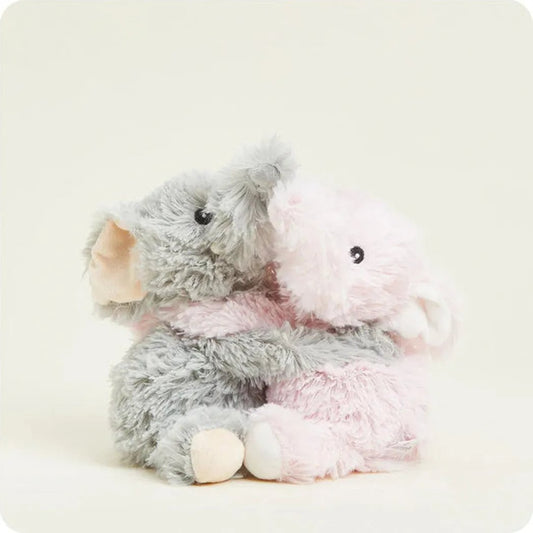A front view of the Warmies Elephant Hugs plush toy showing its soft gray and pink fur against a plain white background.