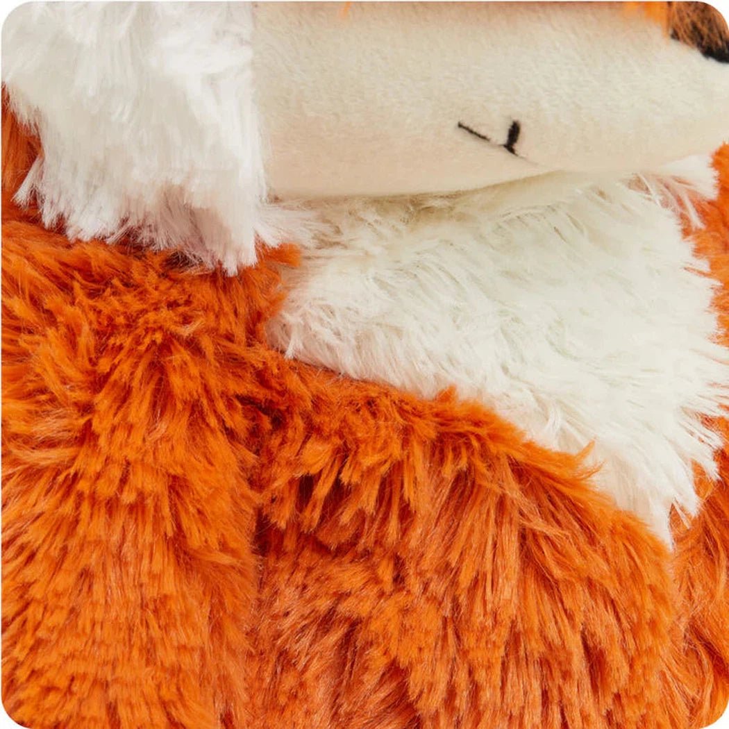 Close-up of the Warmies Fox showing its orange and white fur texture.