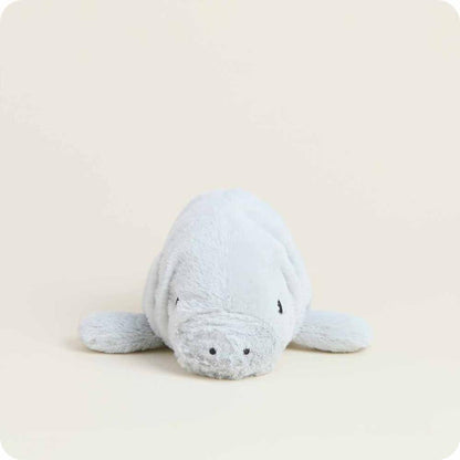 A light blue Warmies Manatee Junior plush toy sits on a plain background.