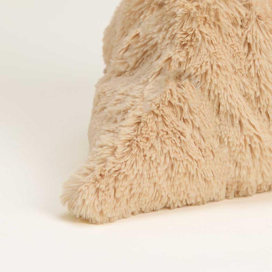 A close-up of the Warmies Megalosaurus plush toy showing its soft, fuzzy texture against a plain white background.