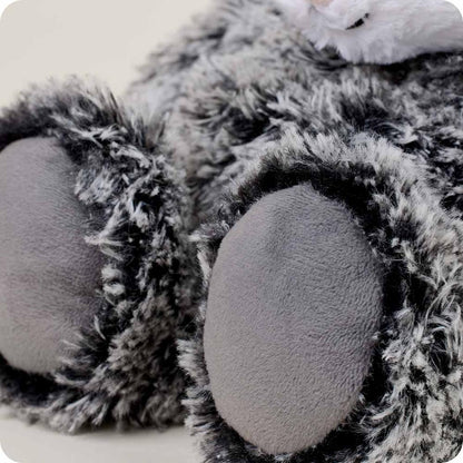 Close-up of the Warmies Opossum showing its fuzzy paw pads and soft fur texture.