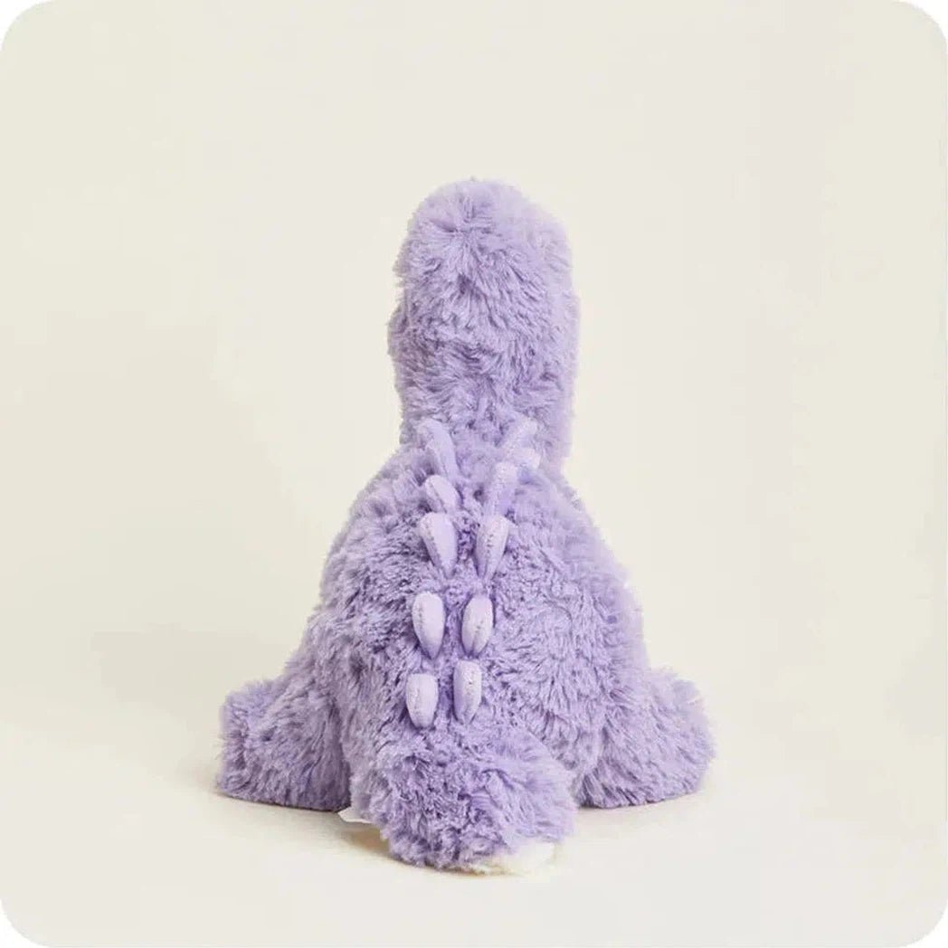 Back view of the Warmies Purple Long Neck Dinosaur showing its fluffy back and tail against a plain white background.