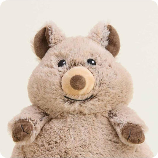 A front view of the Warmies Quokka plush toy with a light brown body and dark brown ears and paws against a plain white background.