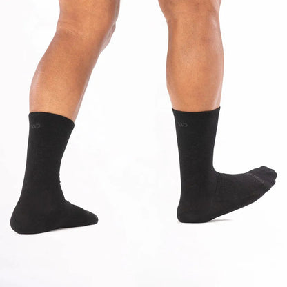 Side view of the Wide Open Men's Solid Lightweight Crew Socks in Black on a white background.