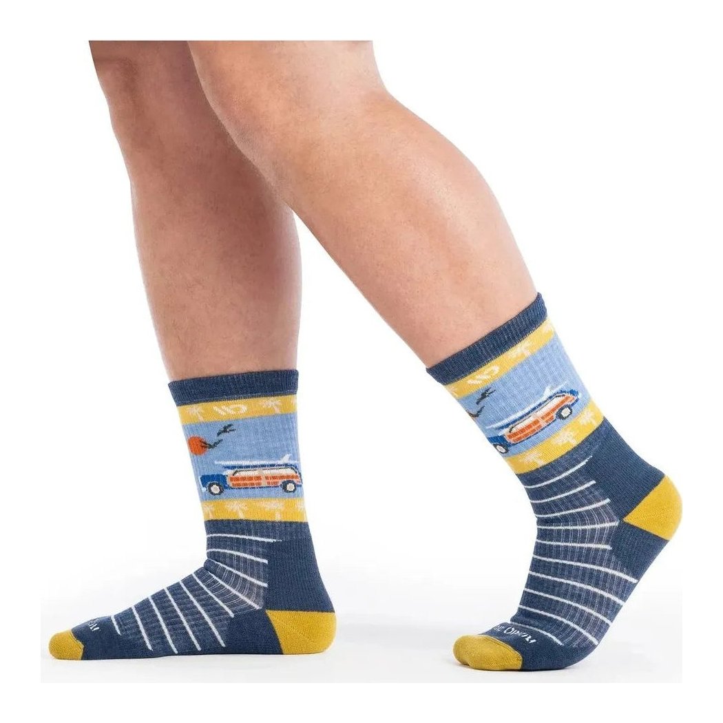 Side view of the Wide Open Men's Way Black Midweight Crew Sock in Denim showing the car graphic and yellow toe on a white background.