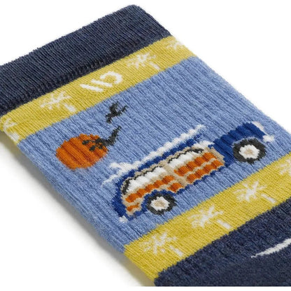 A close-up of the Wide Open Men's Way Black Midweight Crew Sock in Denim showing a van and pumpkin design on a blue background.