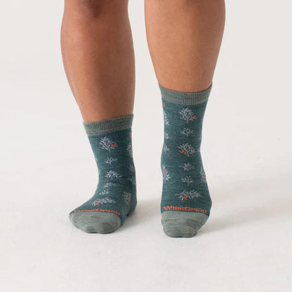 Back view of the Wide Open Women's Foliage Lightweight Micro Crew Sock in Denim on a model against a white background.