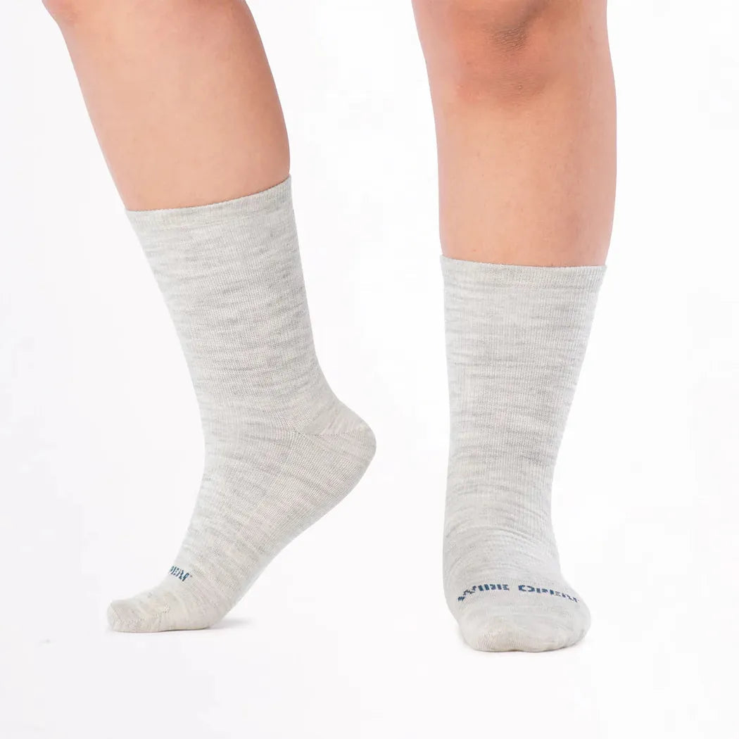 Side view of the Wide Open Women's Solid Basic Crew Lightweight No Cushion Socks in Ash showing the toe and heel against a white background.