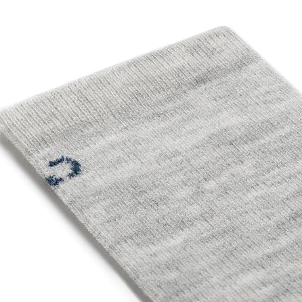 A close-up of the Wide Open Women's Solid Basic Crew Lightweight No Cushion Socks in Ash, showing the ribbed cuff and a small logo on the side against a white background.