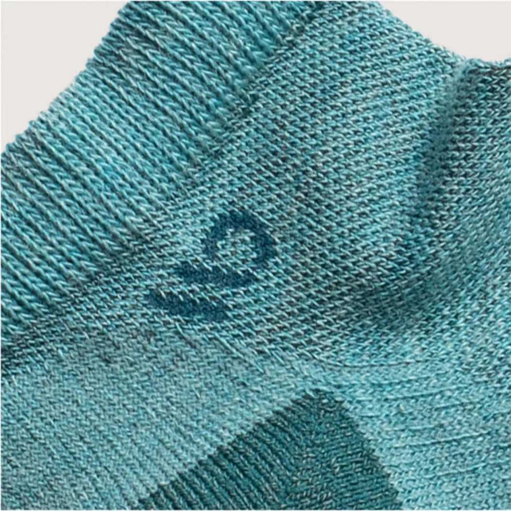 Close-up of the Wide Open Women's Solid Midweight No Show Sock in Charcoal showing the ribbed cuff and textured fabric.