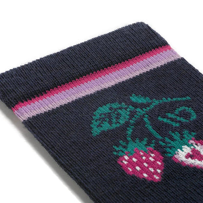 A close-up of the Wide Open Women's Strawberry Patch Crew Midweight Cushion Socks in Eclipse, showing the strawberry design and striped cuff against a white background.