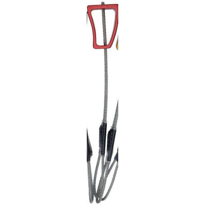 A close-up of the Wild Country Rock climbing protection device with a red top and black spikes against a white background.