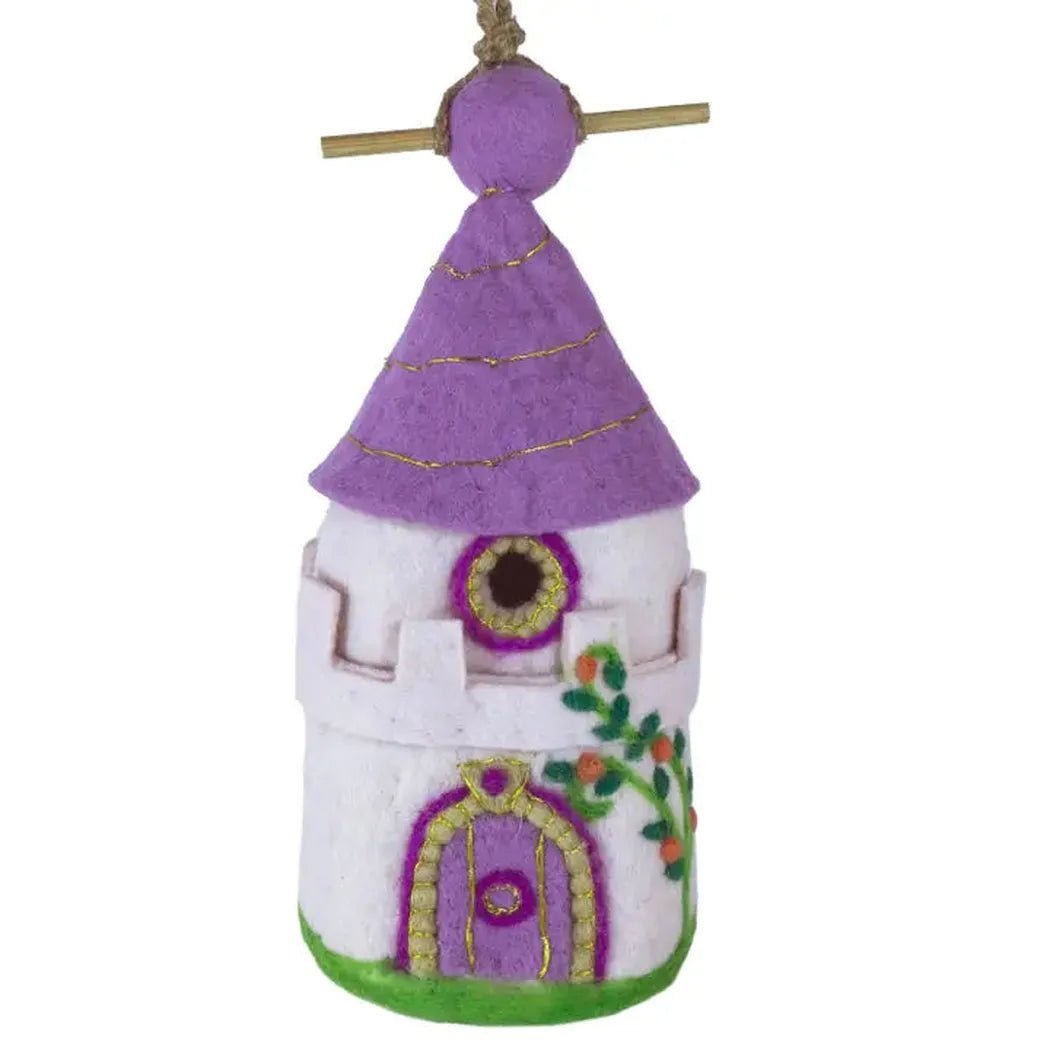 A top-down view of the Wild Woolies Fairy Castle Birdhouse with a purple roof and green base against a white background.